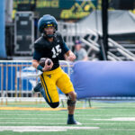 Rich Rodriguez staying quiet on naming WVU's starting QB, isn't opposed to using 2